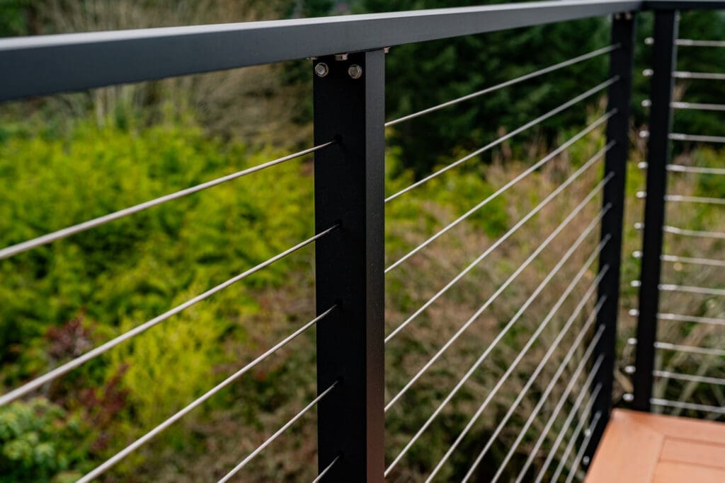 Matte black cable railing hardware detail by Maisy Railing